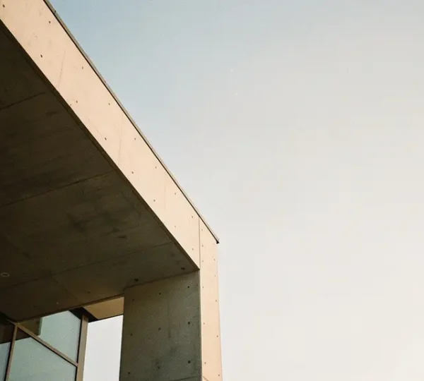 Abstract architectural photography showcasing geometric framing techniques with strong diagonal lines and negative space