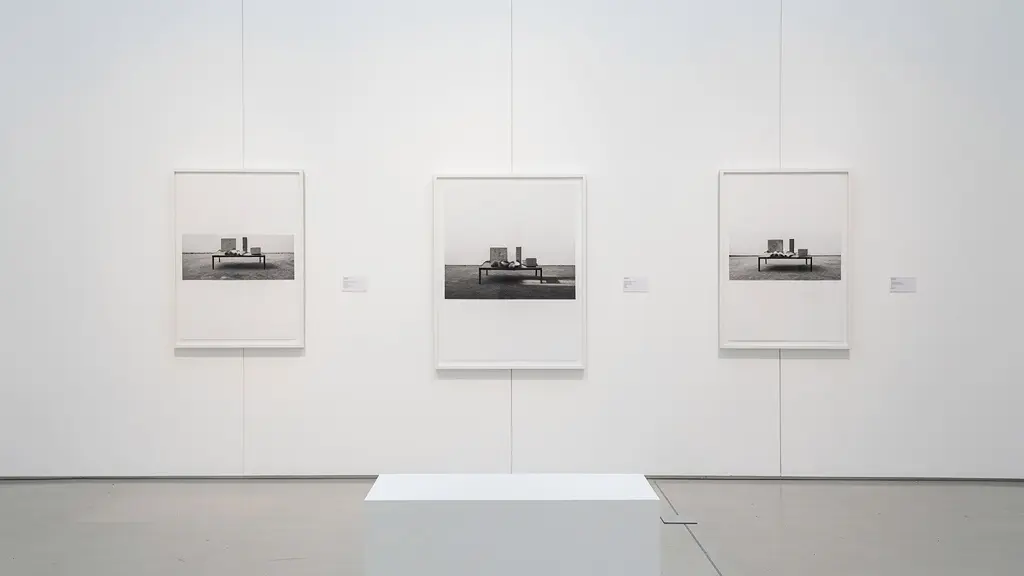 Fine art photography prints displayed in gallery setting showing edition numbers