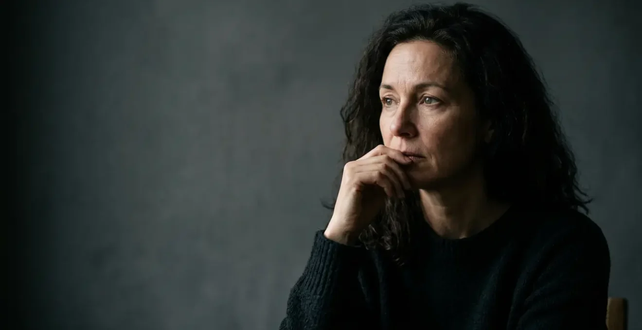 Dramatic portrait photography showcasing deep shadows creating mystery and emotional depth